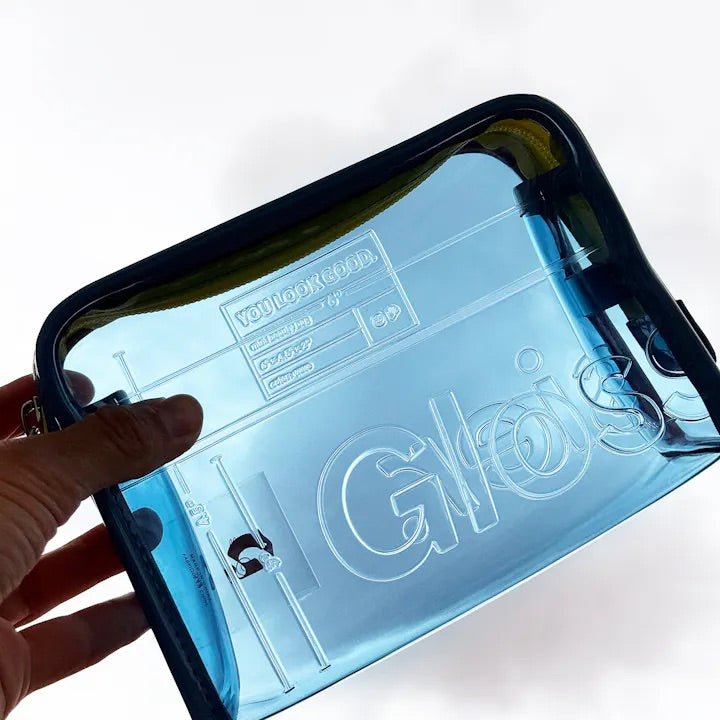 Mini Clear Beauty Bag con cubre polvo - Glossier