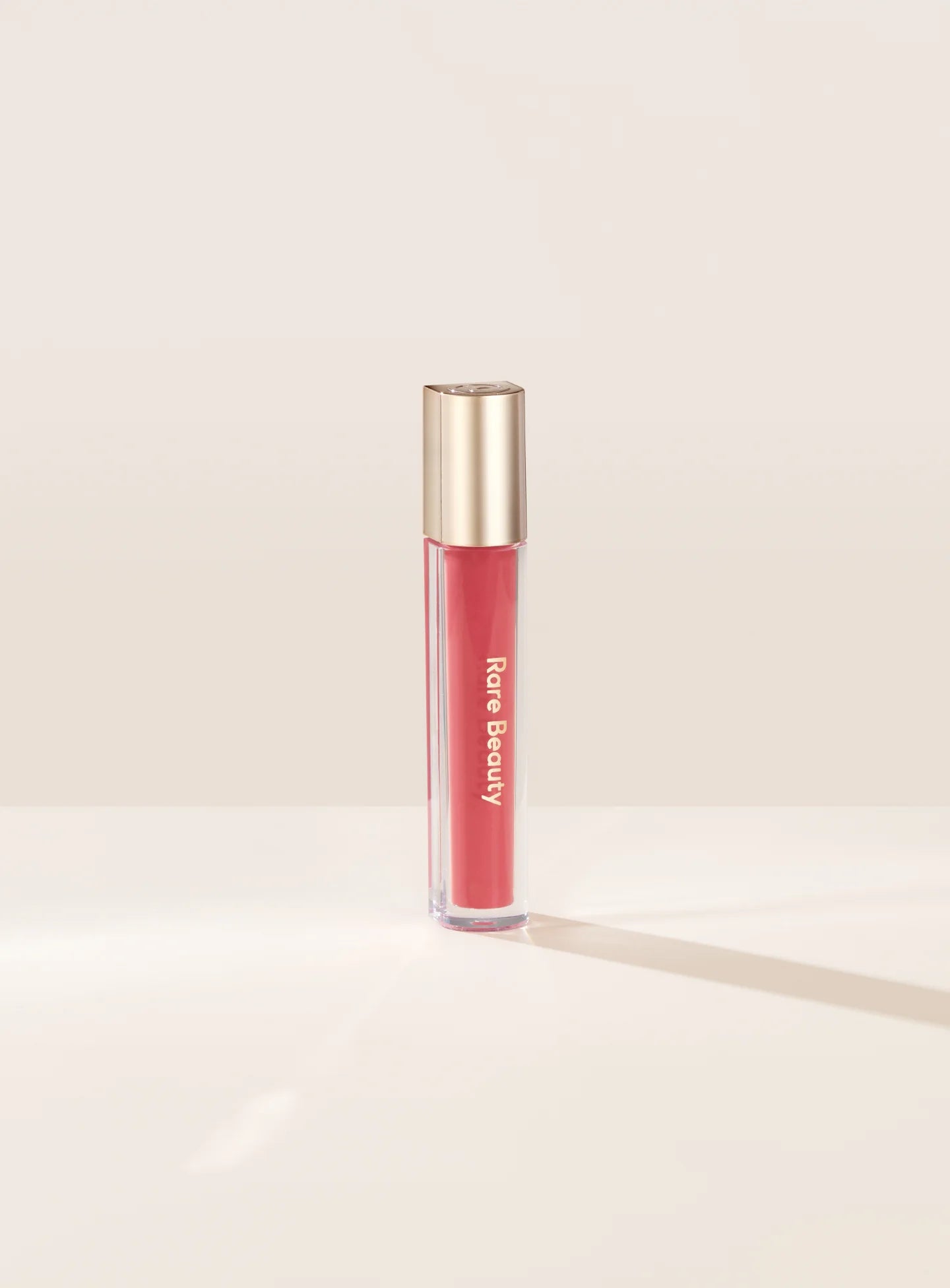 SOBRE PEDIDO - Stay Vulnerable Glossy Lip Balm - Rare Beauty