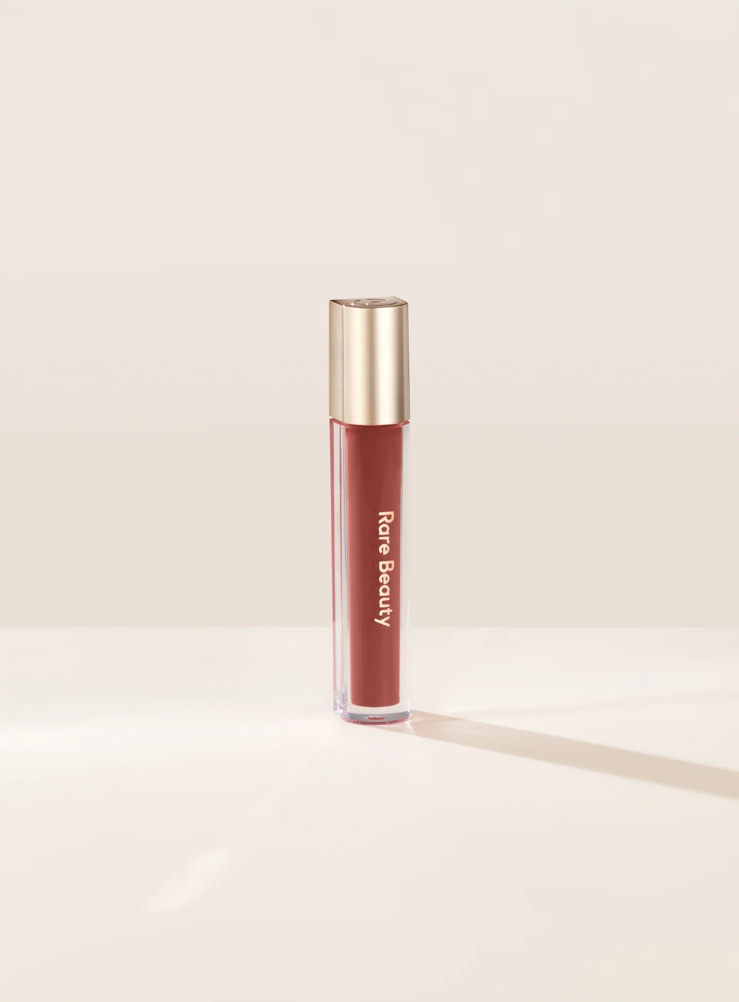 SOBRE PEDIDO - Stay Vulnerable Glossy Lip Balm - Rare Beauty