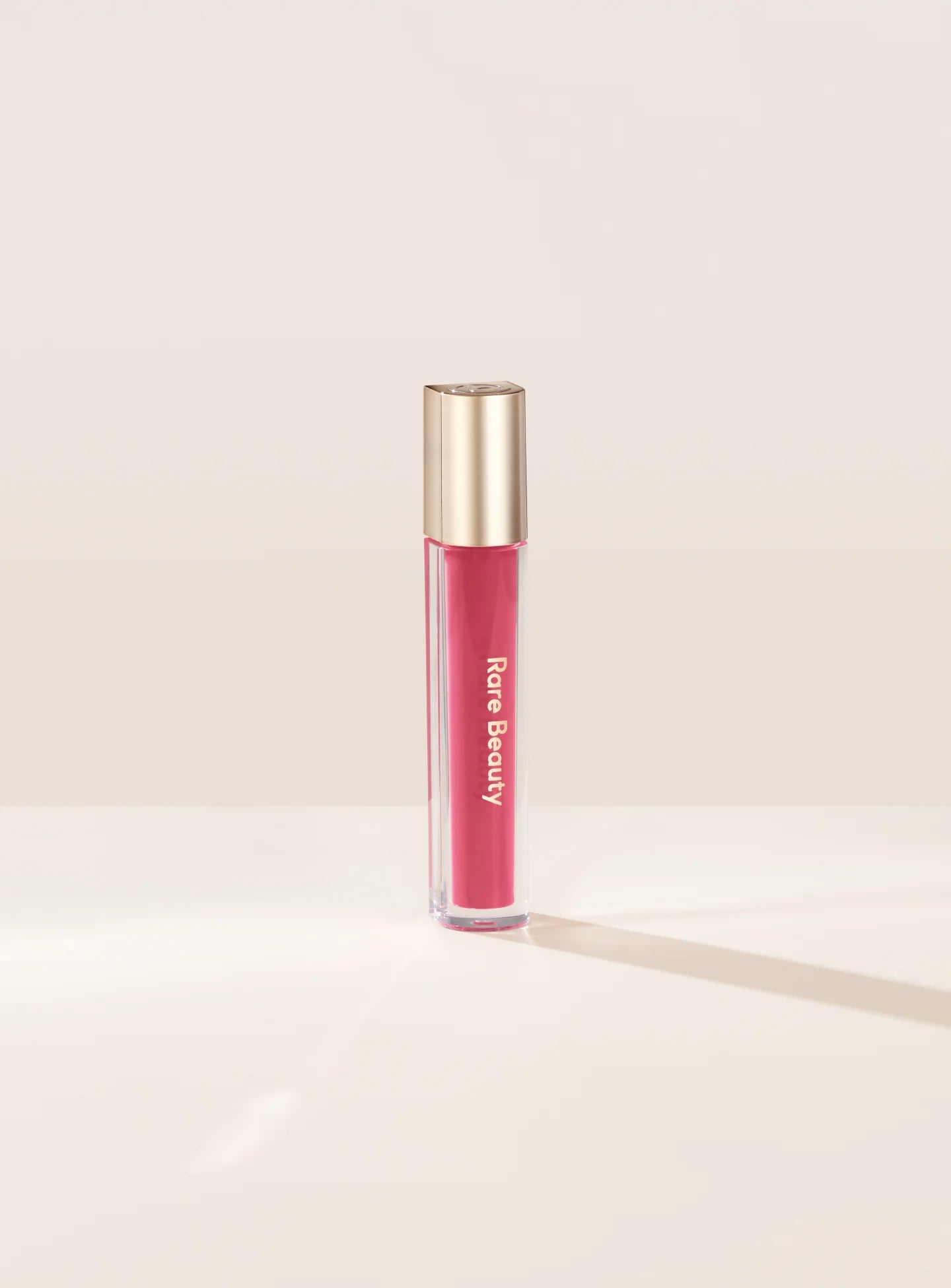 SOBRE PEDIDO - Stay Vulnerable Glossy Lip Balm - Rare Beauty